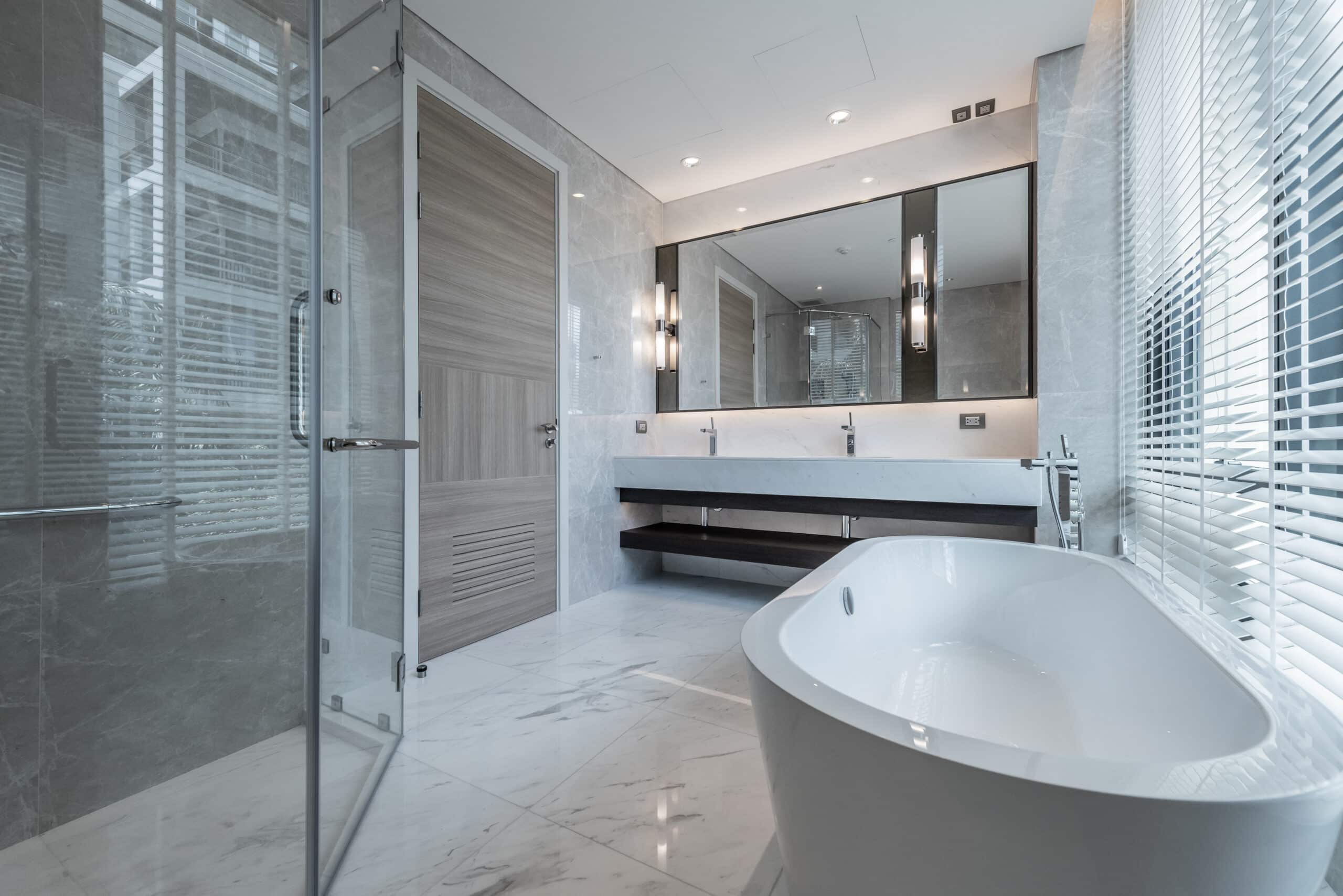 bathroom remodel with large acrylic bath walls